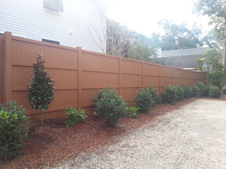 Another beautiful, stained fence by CertaPro Painters of Mobile, AL